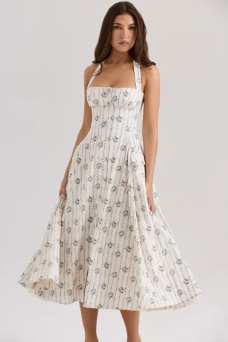 Abito midi con scollo all’americana in cotone elasticizzato con stampa margherite color crema di Claudia