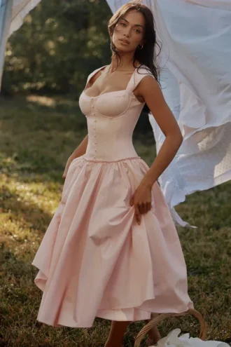 Abito midi rosa in cotone con maniche ad aletta Kaia