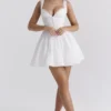 Abito mini a corsetto Brigitte in cotone bianco con ricamo inglese