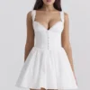 Abito mini a corsetto Brigitte in cotone bianco con ricamo inglese