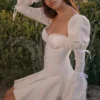 Abito mini bianco in cotone con maniche a tromba Ellerie