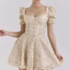 Abito mini con maniche a sbuffo in chiffon con stampa floreale color crema Melita