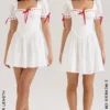 Abito mini Jana bianco con maniche a sbuffo in broderie anglaise