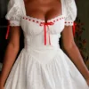 Abito mini Jana bianco con maniche a sbuffo in broderie anglaise