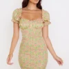 Abito mini vintage a maniche a sbuffo con motivo floreale Tanaya